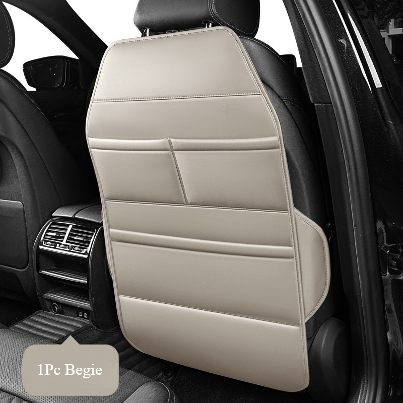 product-open-9bfbaa6ca7d248c79f9310caee24cd24-goods Premium PU Leather Seat-Back Organiser & Kick Protector – Beige - Image 1
