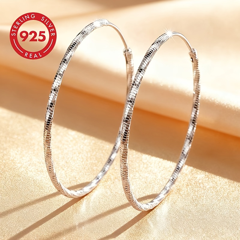 product-fancy-eae66fe6-6e29-4461-8097-8136a21e68ba Diamond-Cut Classic Hoop Earrings in Sterling Silver - Image 1